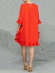 FJØRNA falbala solid color round-neck midi dress with a flowing silhouette and elegant design, displayed on a dress form.