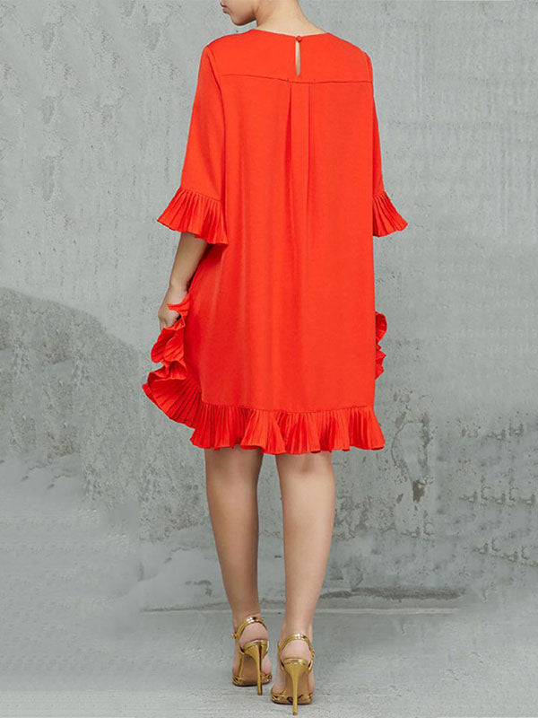 FJØRNA falbala solid color round-neck midi dress with a flowing silhouette and elegant design, displayed on a dress form.
