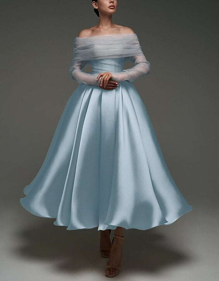 Pink satin midi dress for women featuring strapless, A-line silhouette, with shawl and strappy details by FJØRNA.