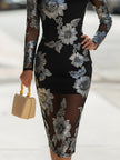 FJØRNA sheer embroidered floral appliqué midi dress with delicate floral patterns and elegant silhouette, perfect for special occasions.