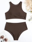 FJØRNA women's sporty bikini set with elegant cut, featuring stylish swimwear design and supportive fit for active beach days.