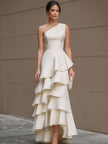 Ivory FJØRNA one-shoulder tiered ruffle maxi dress for women, featuring a flowing white gown with layered ruffles and elegant design.