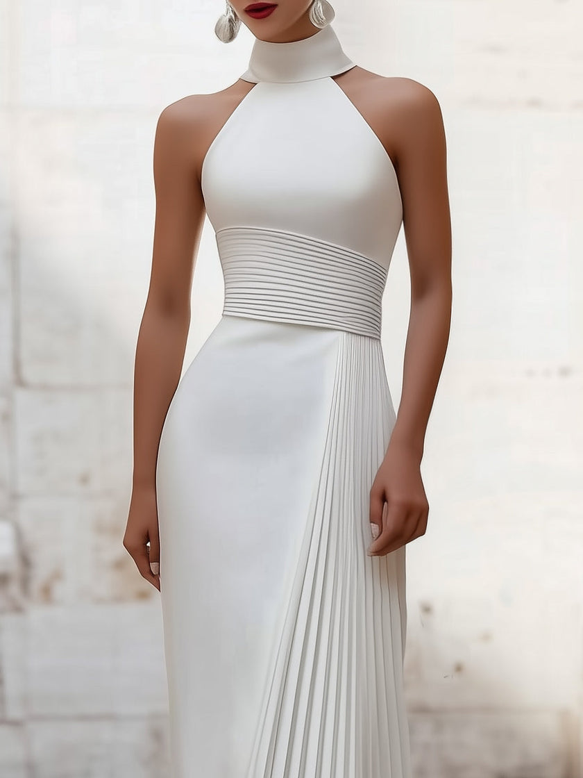 FJØRNA elegant satin pleated halter-neck evening gown, shown in rich fabric with flowing pleats and a stylish halter neckline.