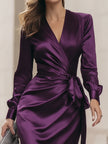 FJØRNA deep purple satin wrap midi dress for women, featuring elegant long sleeves and a flattering waist tie.