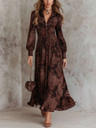 FJØRNA Eloise paisley zip-waist maxi dress in white, flowing fabric with a fitted waist and elegant maxi length.