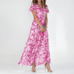 FJØRNA elegant mini dress for women, flowy evening dress with stylish design, suitable for formal or special occasions.