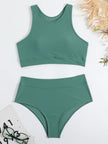 Women's sporty bikini set with elegant cut by FJØRNA, featuring a stylish swimwear design perfect for beach and pool.