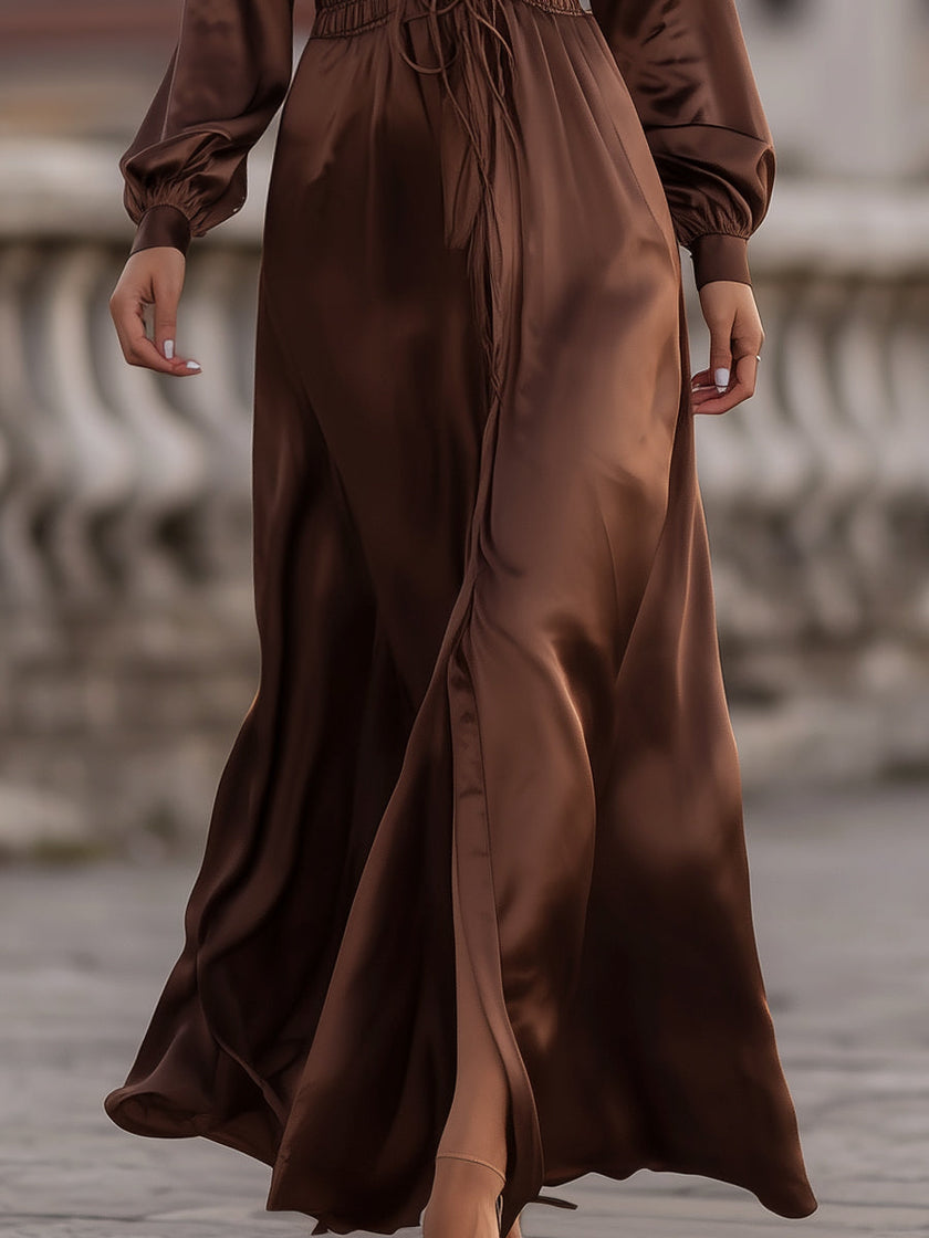FJØRNA satin cinched waist maxi dress in mocha brown, featuring a flowing silhouette and elegant design.