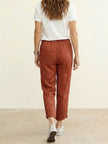 FJØRNA Felicity women's drawstring casual pants in soft fabric with a relaxed fit and adjustable waist, shown on a model.