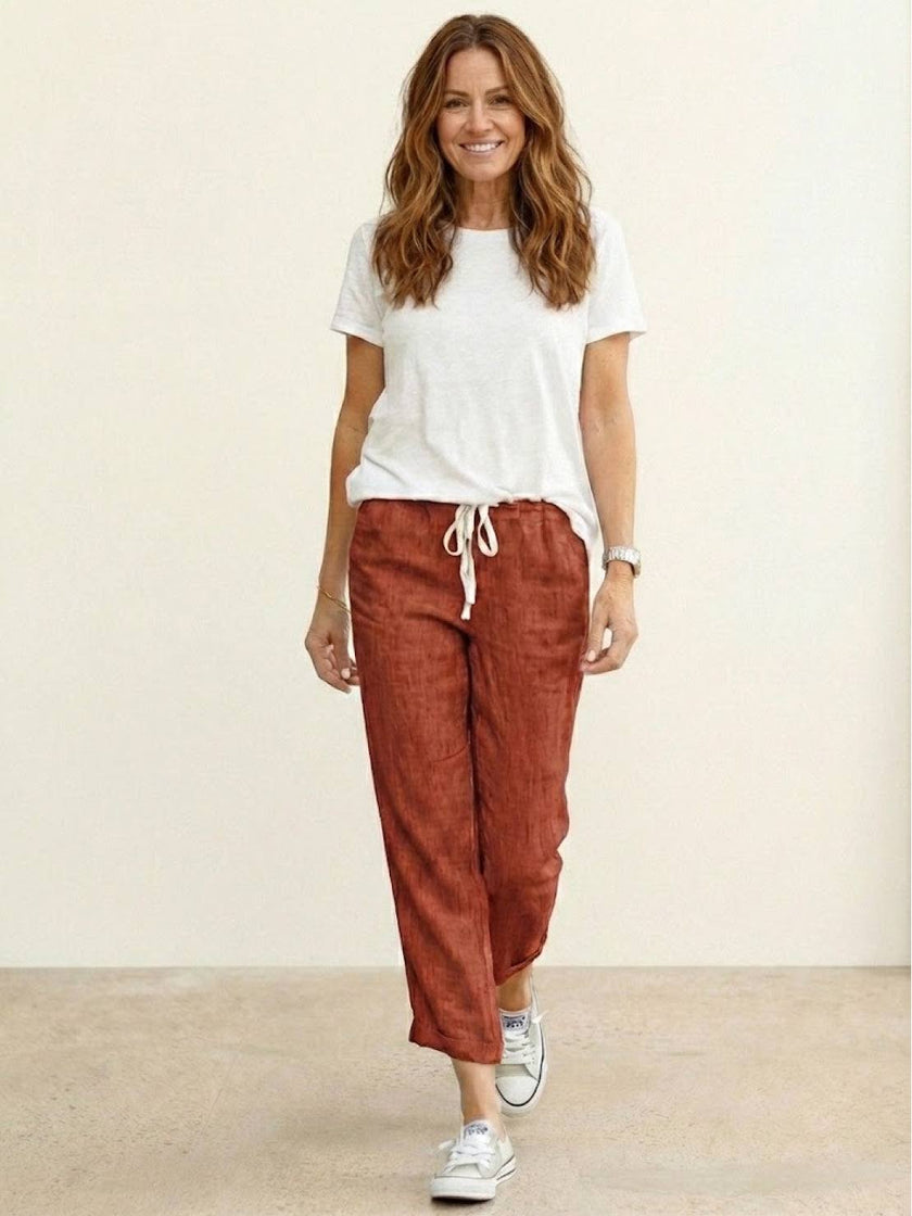 FJØRNA Felicity women's drawstring casual pants in soft fabric, showing relaxed fit and adjustable waistband on a model.