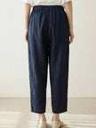 FJØRNA Felicity women's drawstring casual pants in neutral fabric, featuring a relaxed fit and comfortable waistband.