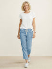 FJØRNA Felicity women's drawstring casual pants in neutral fabric, featuring relaxed fit and adjustable waistband.