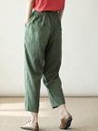 FJØRNA Felicity women's drawstring casual pants in neutral fabric, showcasing relaxed fit and comfortable style.