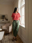 FJØRNA Felicity women's casual drawstring pants in neutral fabric, shown on a model, featuring relaxed fit and comfortable waistband.