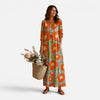 Women's floral maxi dress by FJØRNA featuring a relaxed boho style with a flowy silhouette and vibrant floral print.