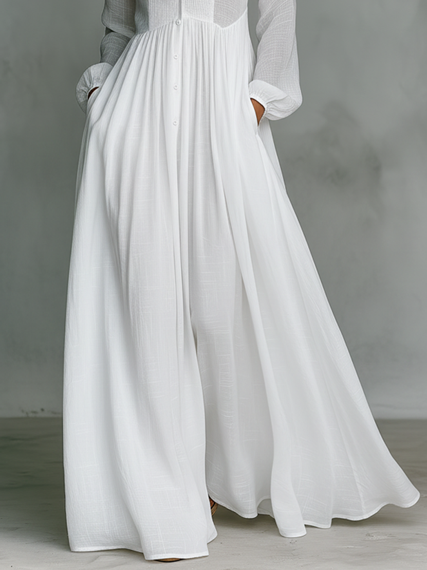 FJØRNA women's summer maxi dress with twist front design, made of lightweight linen fabric, stylish and comfortable for warm weather.