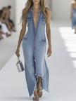 Light blue denim sleeveless jumpsuit with raw edges and wide-leg design by FJØRNA, shown on a model.