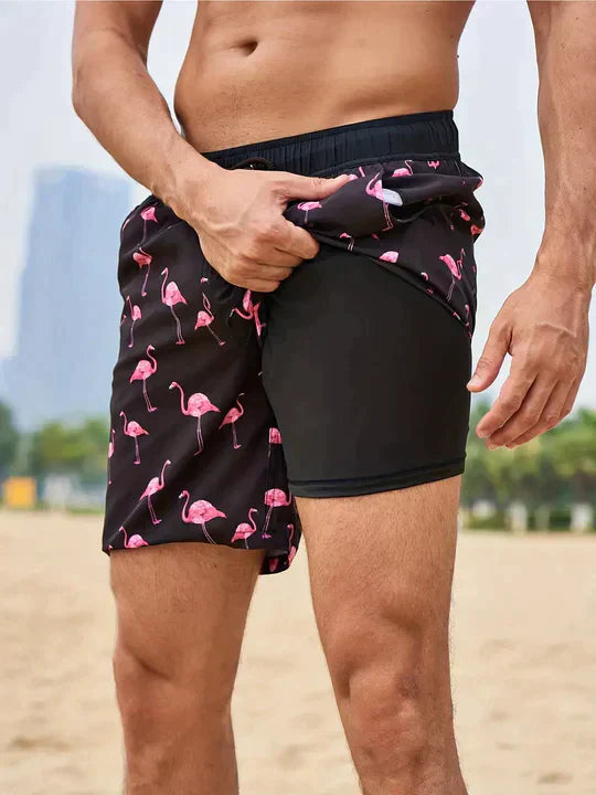 Men's FJØRNA secure fit swim shorts for the beach, navy blue men's swimwear with adjustable waistband and quick-dry fabric.