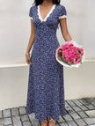 FJØRNA lace patch floral V-neck maxi dress in white, featuring delicate lace details and flowing fabric.