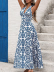 FJØRNA white halter print backless maxi dress, sleeveless design with flowing fabric and elegant backless style.