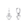 Silver FJØRNA White Quartz Heart Huggie Earrings for women, close-up of heart-shaped white quartz stones in silver huggie hoops.