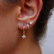 FJØRNA unisex piercing set with gold and green accents, featuring stylish accessories for women, designed for all-day comfort