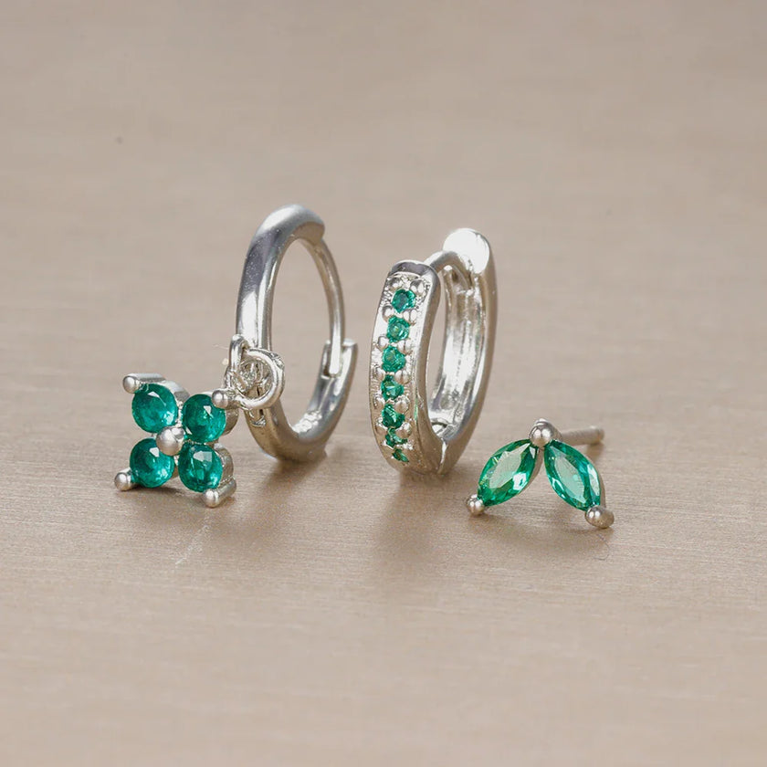 FJØRNA unisex piercing set with gold and green accents, stylish accessories for women, designed for all-day comfort.