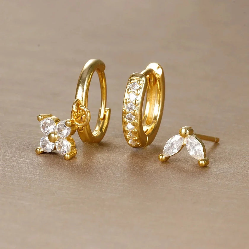 FJØRNA unisex piercing set for women featuring gold and green hazel accessories, stylish and comfortable for all-day wear
