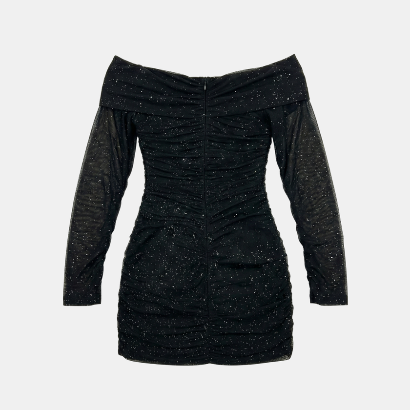 FJØRNA Ella women's black mini dress with sparkle mesh, size XS, featuring a stylish and fitted design for elegant occasions.