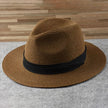 FJØRNA Carolous men's Panama hat, handcrafted in white, featuring a classic elegant design and wide brim for stylish sun protection.