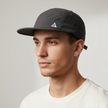 Black men's FJØRNA adjustable and packable hat, stylish men's cap with a comfortable fit and classic design.