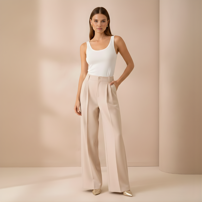 Beige FJØRNA wide leg high waist tailored pants for women, showcasing a relaxed fit and stylish design.