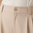 Beige high waist wide leg tailored pants for women by FJØRNA, stylish and comfortable for modern casual or office wear.