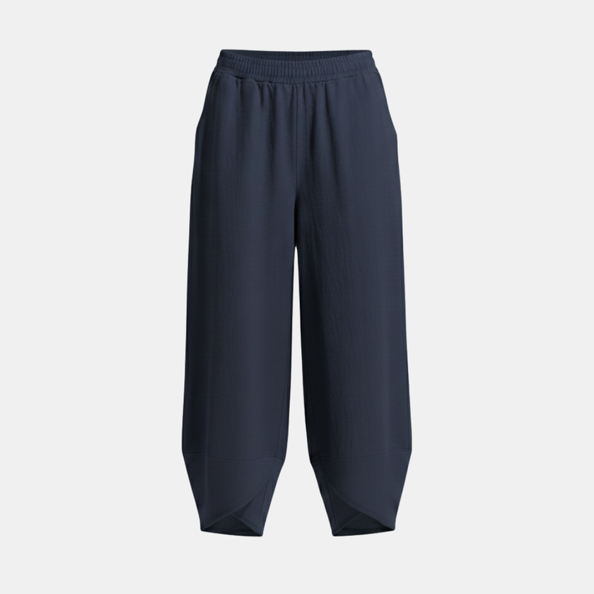 Black women's wide leg trousers with elastic waist from FJØRNA, loose cotton pants for a relaxed, comfortable fit.