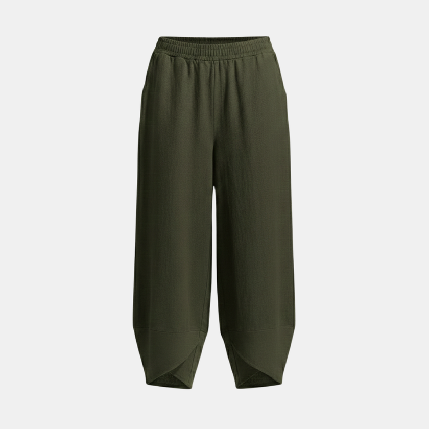 Black women's FJØRNA wide leg trousers with elastic waist, loose fit, cotton fabric, stylish and comfortable for everyday wear.