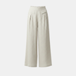 FJØRNA Liam women's high waist wide-leg pants in yellow cotton linen with pockets, featuring a plain color and relaxed fit.
