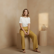 FJØRNA Liam women's wide-leg cotton linen pants in yellow with high waist and pockets, casual and comfortable for everyday wear.