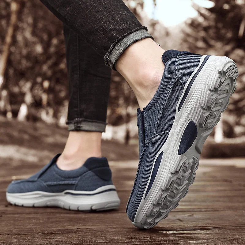FJØRNA men's blue canvas loafers, orthopedic slip-on shoes with breathable material and comfortable design.