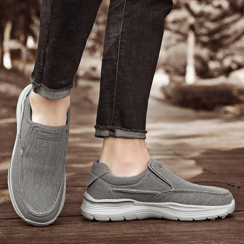 Blue canvas loafers for men by FJØRNA, orthopedic slip-on shoes with breathable fabric and comfortable design.