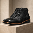 Black FJØRNA men's leather boots with stylish design, featuring a sleek ankle-high silhouette and sturdy sole.