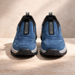 Men's blue FJØRNA hiking shoes with orthopedic support, supportive hiking boots designed for comfort and durability.