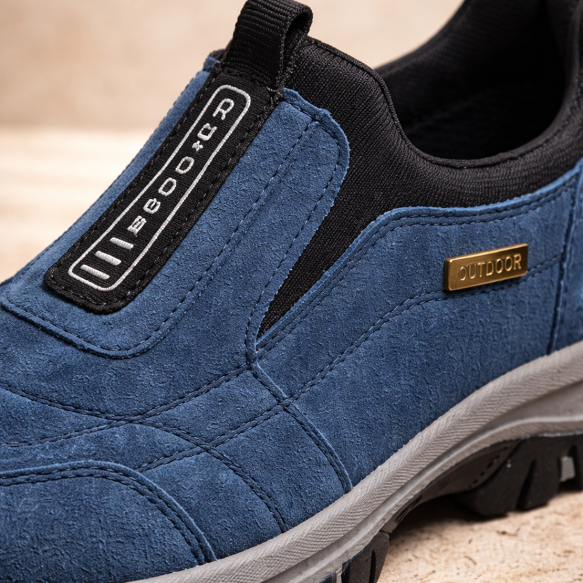 FJØRNA men's orthopedic hiking boots in blue with supportive features, designed for comfort and outdoor hiking.
