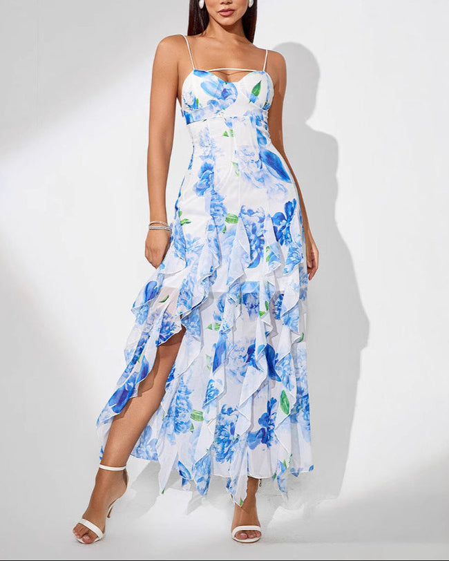 White Ruffle Hem Midi Dress by FJØRNA featuring floral pattern, spaghetti straps, and ruffle details in a front view.