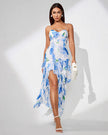 White Ruffle Hem Midi Dress by FJØRNA featuring floral straps, ruffle details, and a slit for a stylish, feminine look.