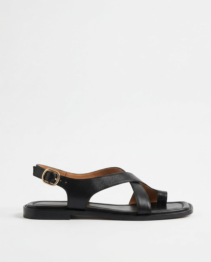 FJØRNA women's Italian leather sandals with adjustable straps, featuring a cross design on a white studio background.