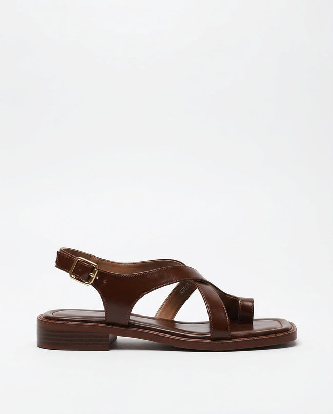 FJØRNA women's Italian leather sandals with adjustable straps, showcasing cross-strap design on a white background.