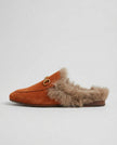 FJØRNA women's plush-lined fur mule slippers with slip-on design, soft interior, and cozy luxury look.