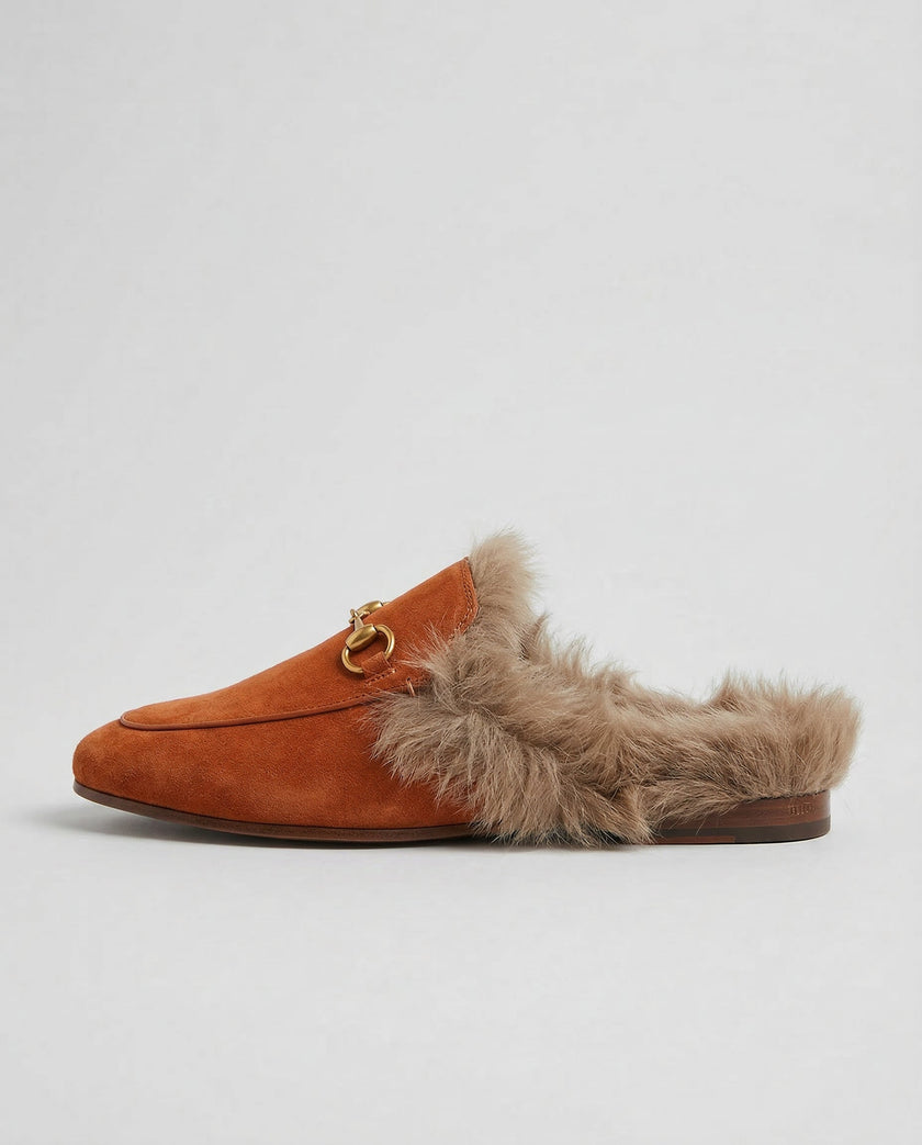 FJØRNA women's plush-lined fur mule slippers with slip-on design, soft interior, and cozy luxury look.