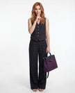 FJØRNA linen wide-leg women’s trousers in a stylish co-ord set, featuring lightweight fabric and relaxed fit for casual wear.