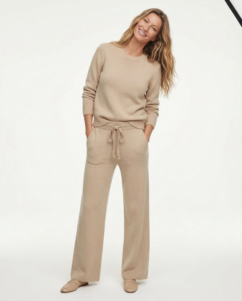 FJØRNA women's joggers, stylish and comfortable pants for women, shown in a casual outfit on a model.
